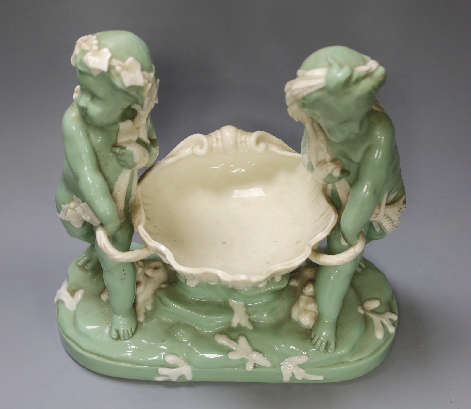 A Minton glazed celadon tinted parian centrepiece, mid 19th century, after Carrier-Belleuse, 26cms high